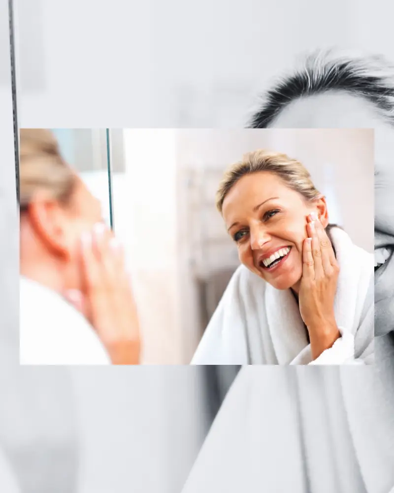 Happy woman in front of the mirror